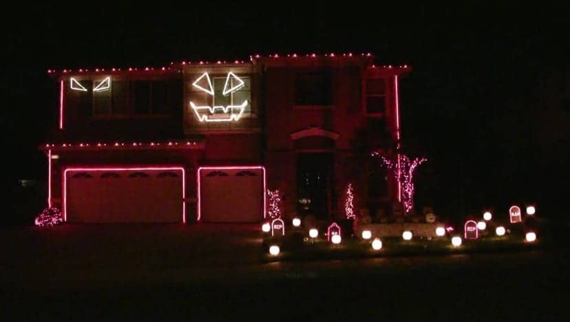 housE decorated with lights for halloween canada