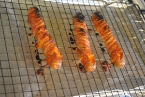 cooked-bacon-wrapped-cheese-filled-hot-dog